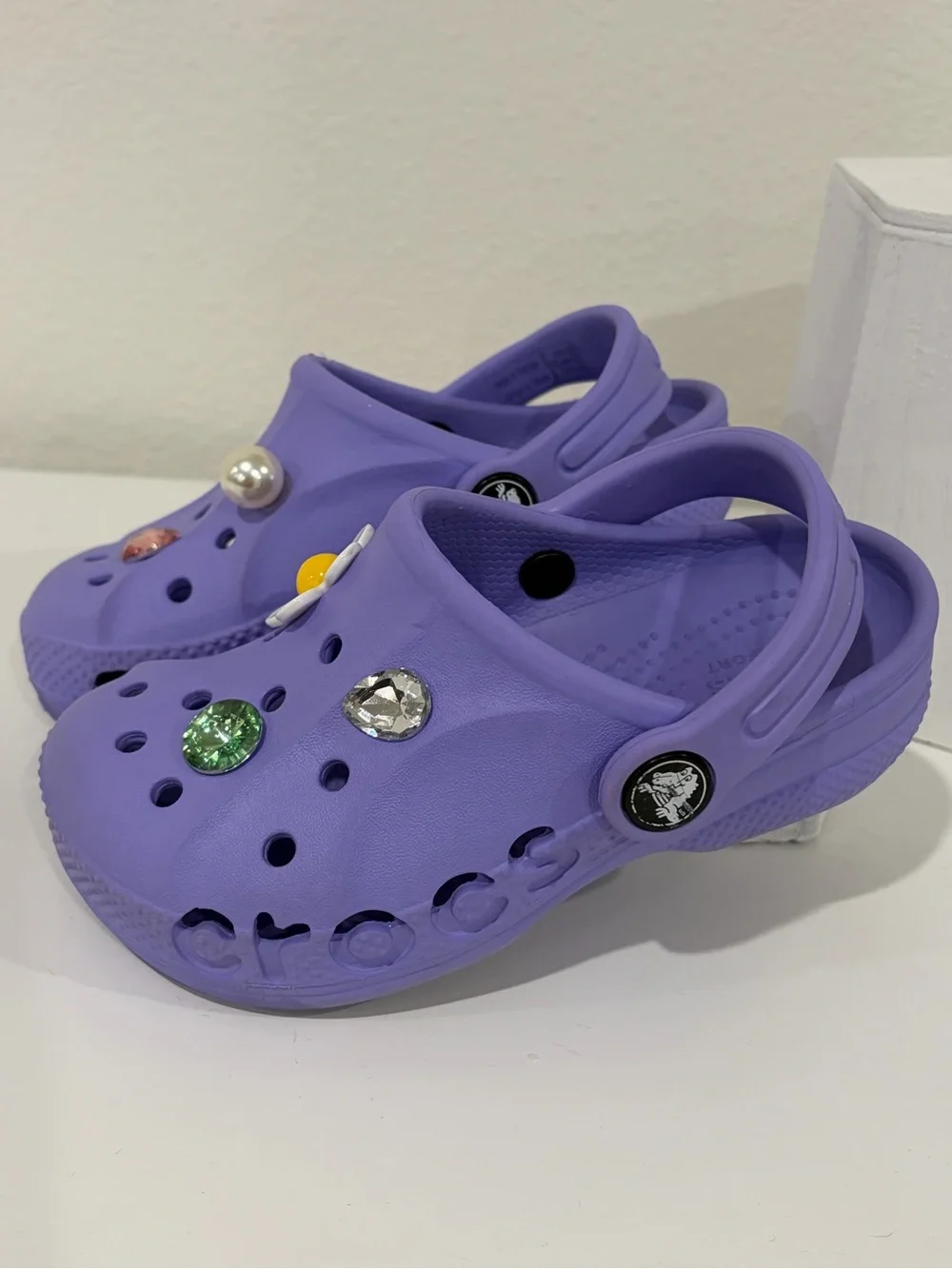 Girls size 9 toddler. Purple CROCS  Great Condition! Charms included